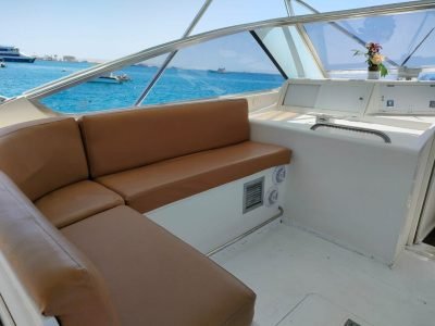 Family enjoying a private boat trip on the Red Sea with snorkeling and lunch on board
