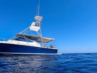 Family enjoying a private boat trip on the Red Sea with snorkeling and lunch on board