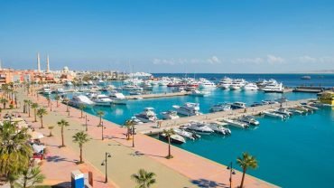 Tourists on a Hurghada VIP City Tour exploring the marina and old town