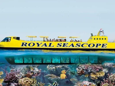 SeaScope Submarine gliding through crystal-clear Red Sea waters near Sharm El Sheikh with colorful fish visible