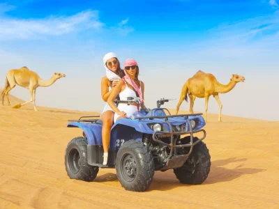 Private Family Safari in Egypt with a jeep driving through golden dunes at sunset
