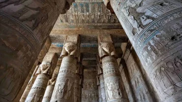 Tourists exploring the Dendera Temple complex near Qena on a day trip from Hurghada