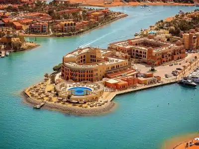 Private vehicle parked near Hurghada Marina during a VIP City Tour with the Red Sea in the background