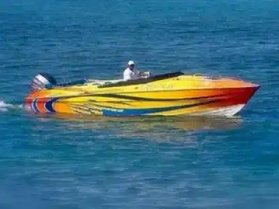 Private speed boat cruising on the Red Sea with blue waters and sunny skies