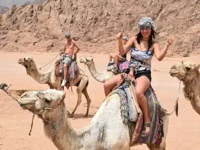 Extreme adventure in Sharm El Sheikh featuring diving, desert biking, and parasailing over the Red Sea