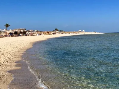 Orange Bay Island boat trip with white sandy beach and turquoise waters in the Red Sea