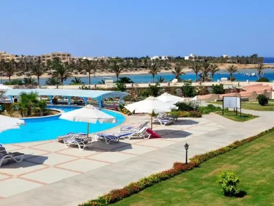 Marsa Alam Shopping Trip with colorful market stalls displaying spices, jewelry, and handmade crafts