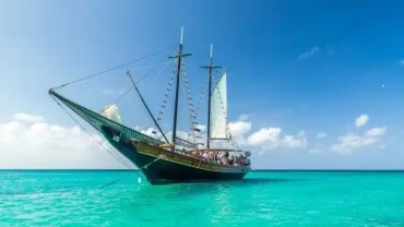 Pirates Sailing Adventure Sharm El Sheikh with a pirate-themed ship sailing on turquoise Red Sea waters