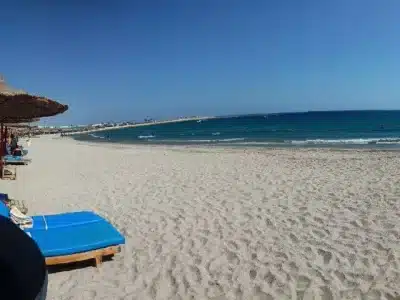 Orange Bay Island boat trip with white sandy beach and turquoise waters in the Red Sea